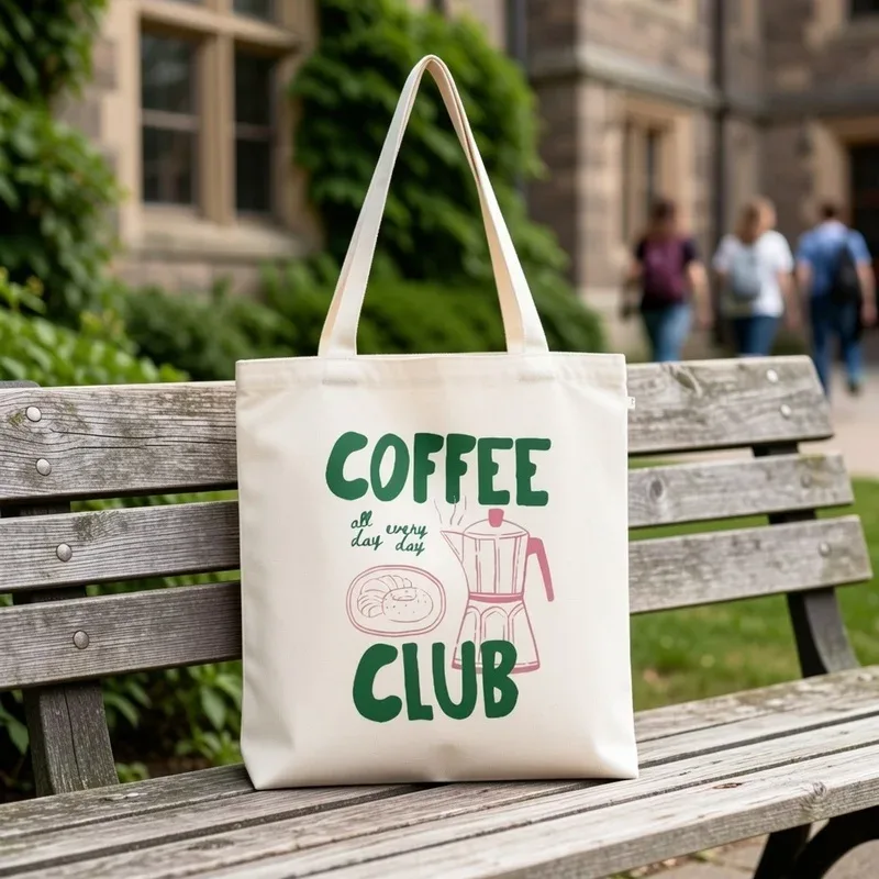 sac fourre-tout sur le thème du café, sac à bandoulière, avec lettrage vert et motif de tasse à café, adapté aux voyages, aux déplacements quotidiens et à une utilisation quotidienne décontractée.