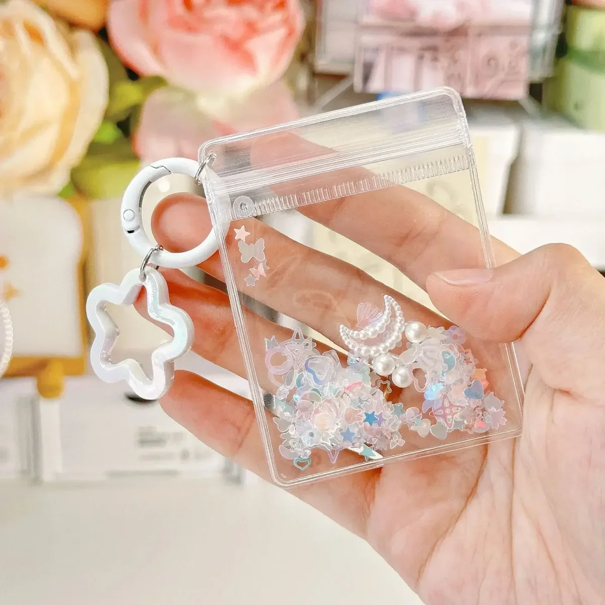 porte-clés mignon et tendance, mini sac de rangement transparent en forme d'étoile à cinq branches pour femme, pendentif pour sac et clés de voiture