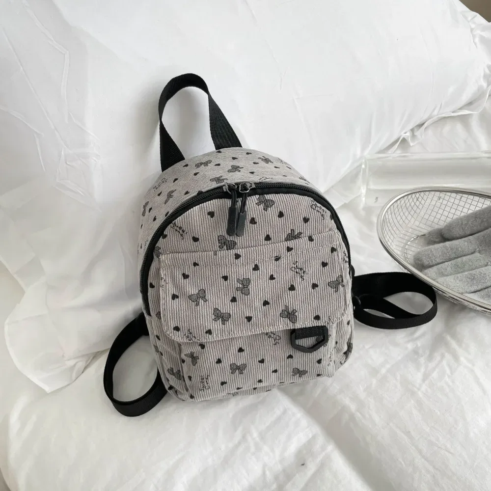 mini sac à dos en velours côtelé léger, multi-compartiments, décontracté, ouverture zippée, imprimé cœur et nœud, pour adolescentes