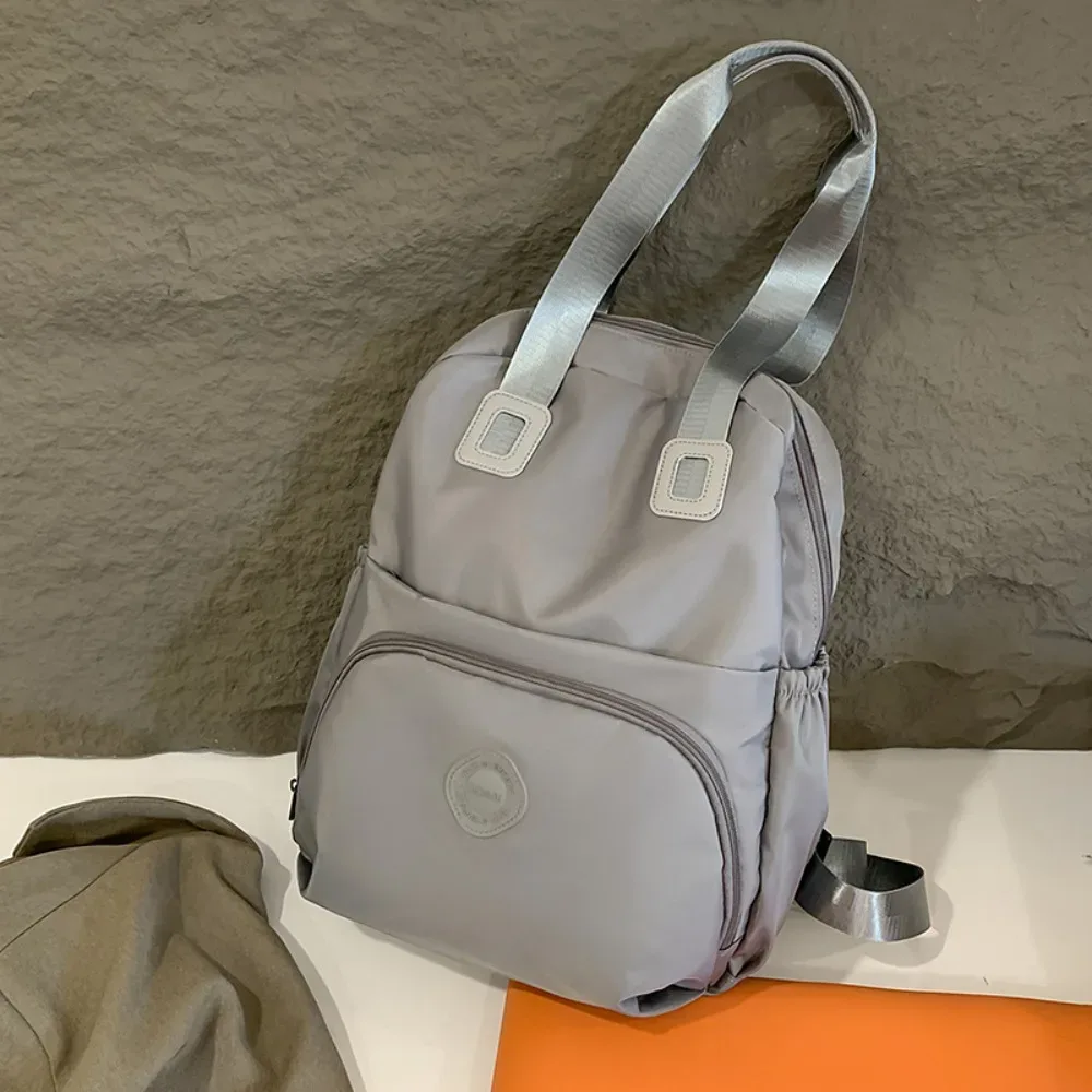 sac à dos sportif décontracté en nylon de style coréen, couleur unie, grande capacité, sac de voyage, sac à bandoulière, sac fourre-tout, sac de fitness en nylon, sac de voyage