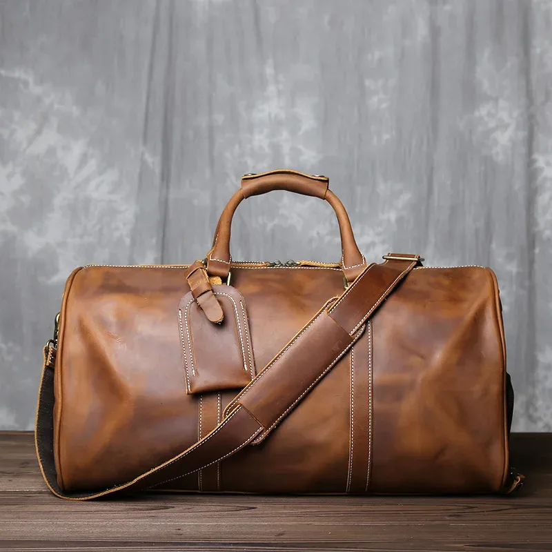 nouveau sac à main rétro pour hommes europe et amérique sac de voyage en cuir de cheval fou couche peau de vache grande capacité sac à bandoulière unique