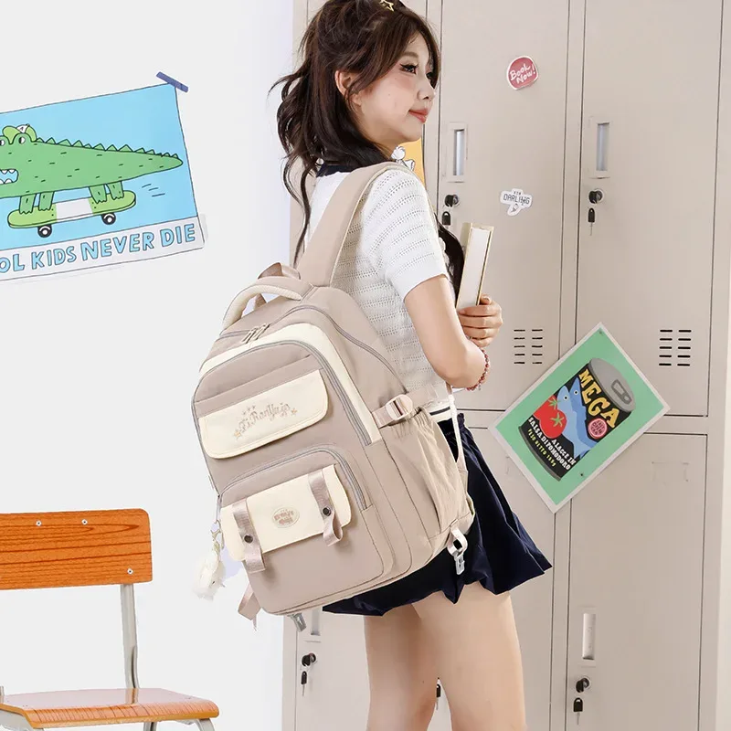 nouveau sac à dos léger et tendance grande capacité pour filles du primaire et du collège en nylon style frais et doux