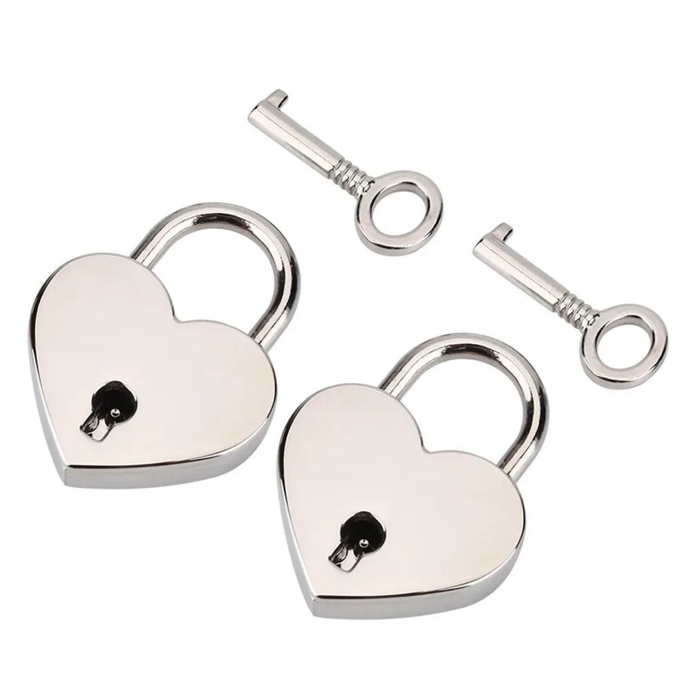 cadenas en forme de cœur argenté, petite taille, mini cadenas avec clé, construction en métal, cadenas en métal pour bagages, 2 pièces