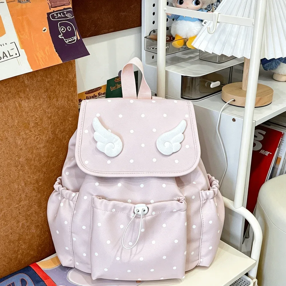 sac à dos à cordon de serrage imprimé à pois, fermeture à cordon, design à rabat, sac à dos pour livres, décor ailes d'ange, style décontracté