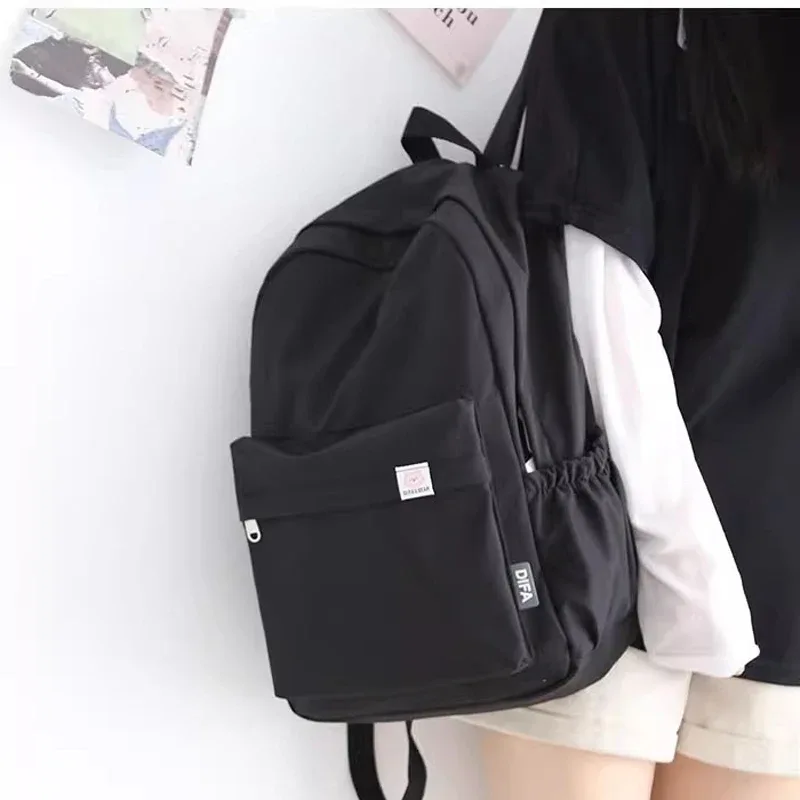 nouveau sac à dos imperméable en nylon pour femmes sac de voyage pour femmes sacs à dos cartable pour adolescentes couleur unie bookbag mochila bookbag