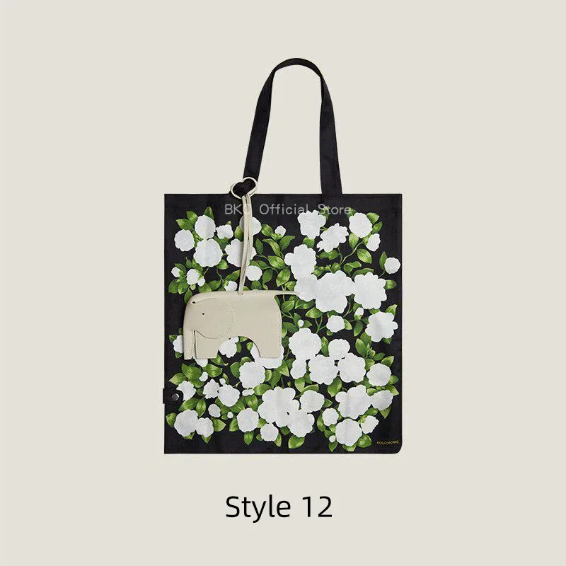 breloque de sac éléphant en peau de mouton avec pochette de rangement en soie, ornement décoratif 2-en-1 et organisateur pratique, accessoire en cuir