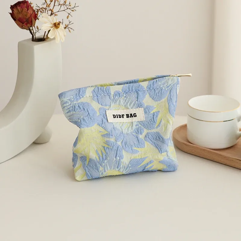 nouveau mini sac à cosmétiques féminin portable rouge doux petit sac de rangement de serviettes hygiéniques sac de clé de monnaie de banlieue sac de carte bancaire portable