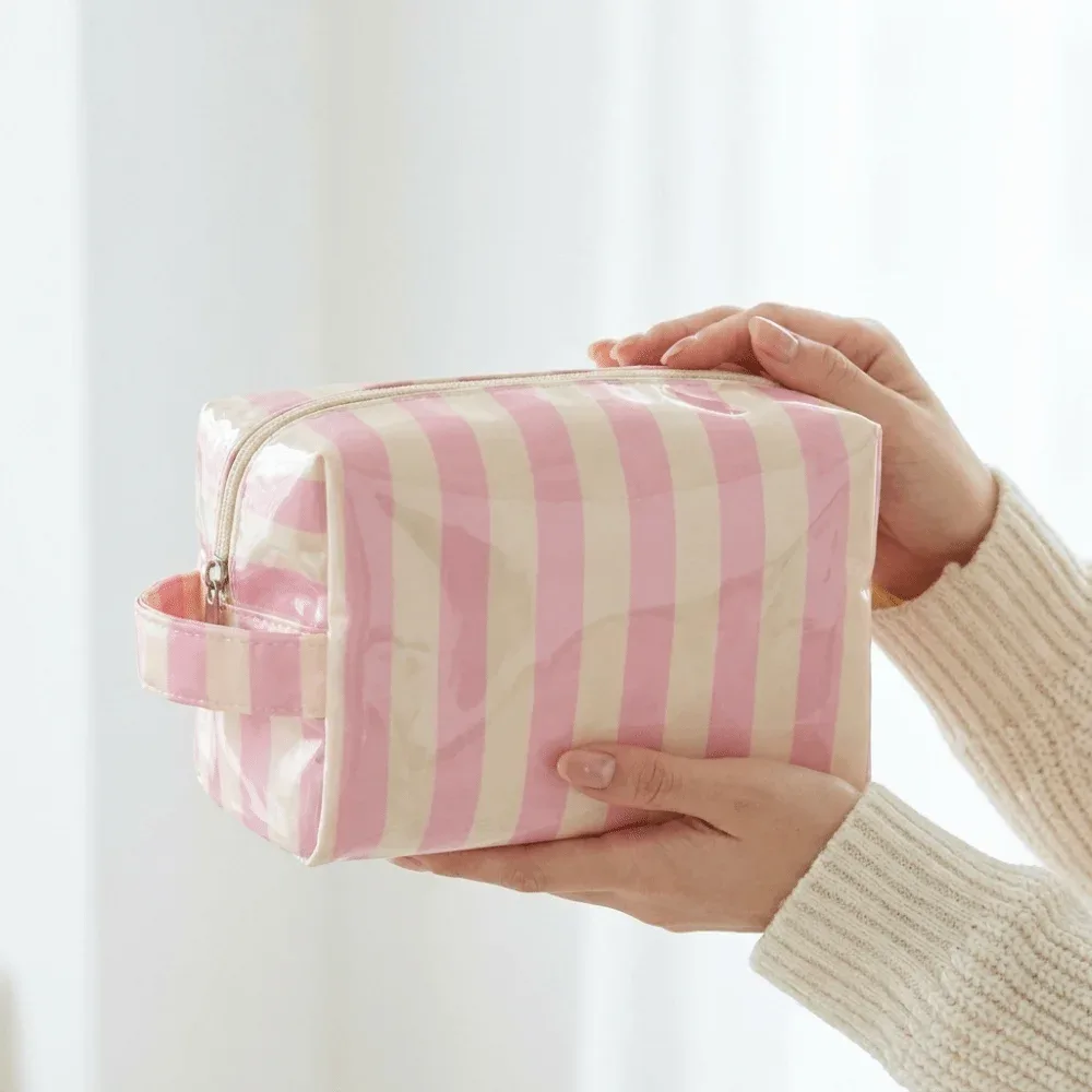 trousse de toilette imperméable rayée grande capacité rose en pvc – organisateur de maquillage portable simple pour voyage – sac de rangement cosmétique pour femme