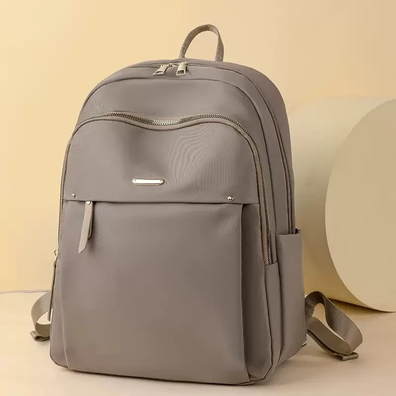 sac à dos en nylon imperméable pour femmes, sac à dos d'école léger, sac à dos de voyage multi-poches, sac à dos élégant pour les loisirs avec fermeture éclair dorée