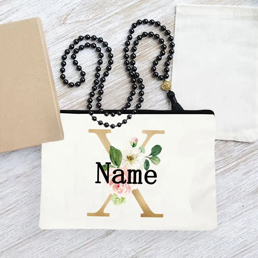 pochette en toile personnalisée avec initiales florales dorées, trousse de toilette légère personnalisée avec monogramme pour femmes, idéale pour les voyages quotidiens.