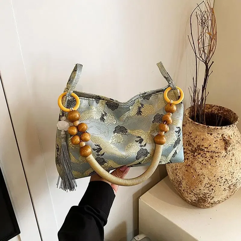 hasp fil à coudre brodé style national sacs à bandoulière gland décoration 2025 printemps nouvelle offre spéciale sacs à main pour femmes