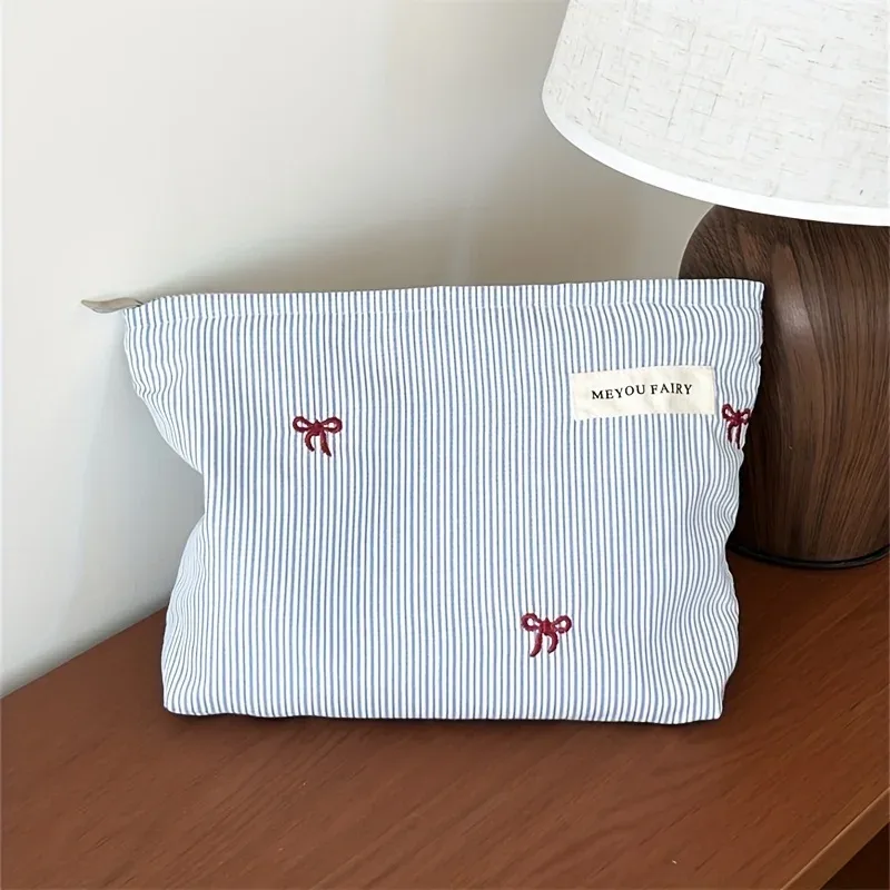 trousse à cosmétiques à nœud rayé bleu clair, organisateur de maquillage de voyage pour femmes avec fermeture éclair, pochette de toilette multi-usage