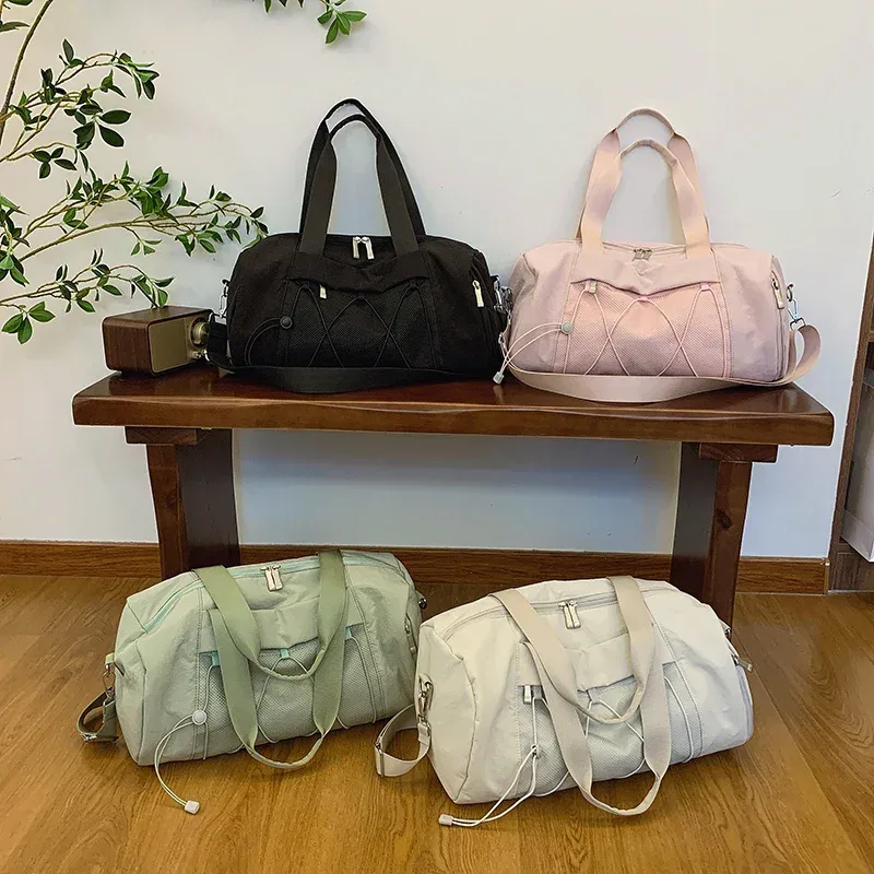 Nouvelle simplicité loisirs solide Oxford grande capacité sacs de voyage 2026 haute qualité Style de base vacances femmes sacs à bandoulière