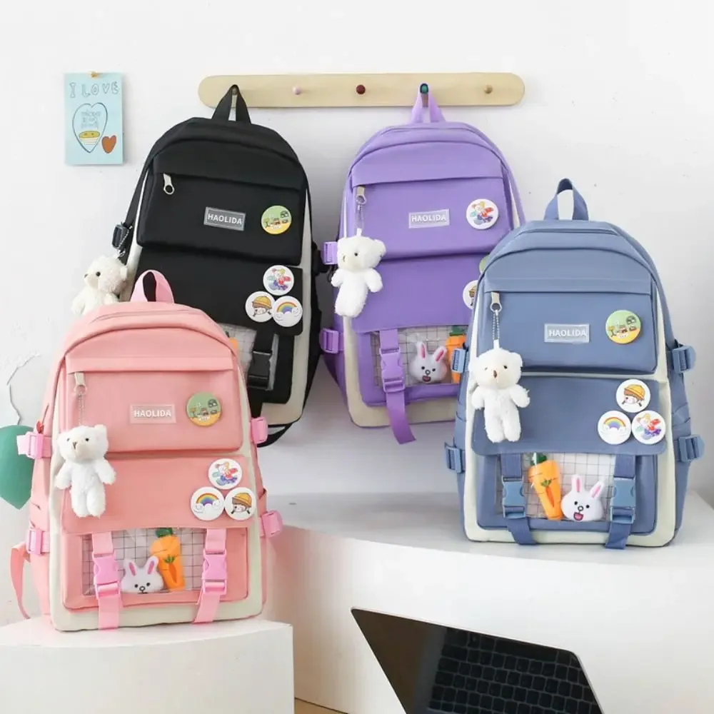 sacs décontractés en nylon de grande capacité, sac à dos à bandoulière avec badge de trajet simple, un ensemble de quatre cartables, sac d'école de style coréen pour enfants
