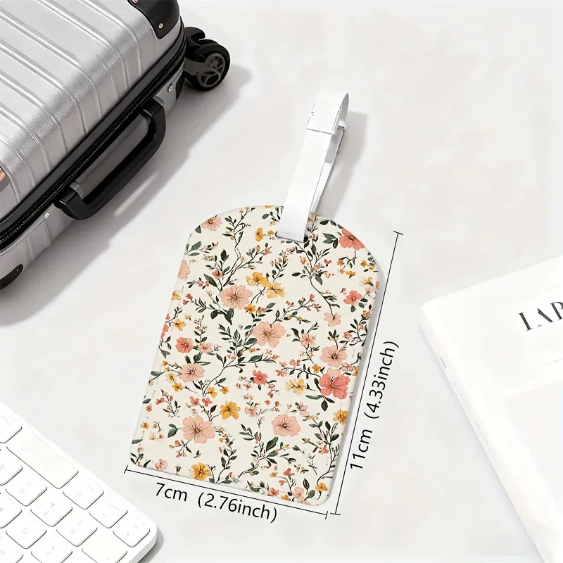 étiquettes de bagages florales colorées rose pastel et vert, avec quincaillerie ton sur ton, motif floral, porte-cartes d'embarquement pour voyage en avion