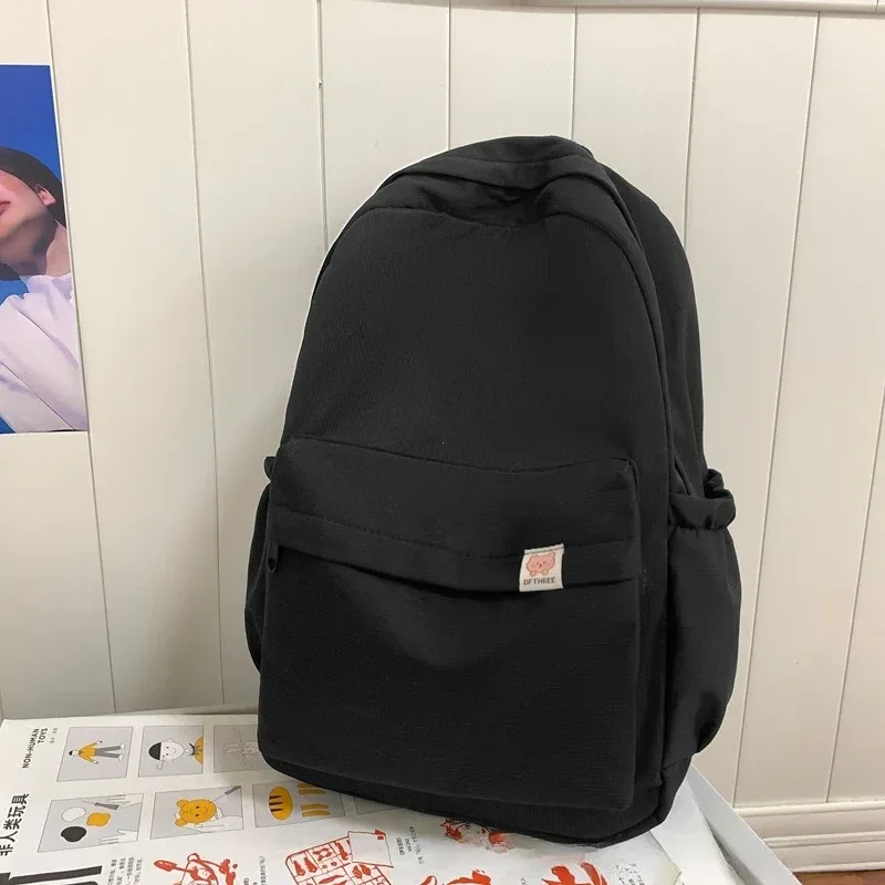 nouveau sac à dos imperméable en nylon pour femmes sac de voyage pour femmes sacs à dos cartable pour adolescentes couleur unie bookbag mochila bookbag