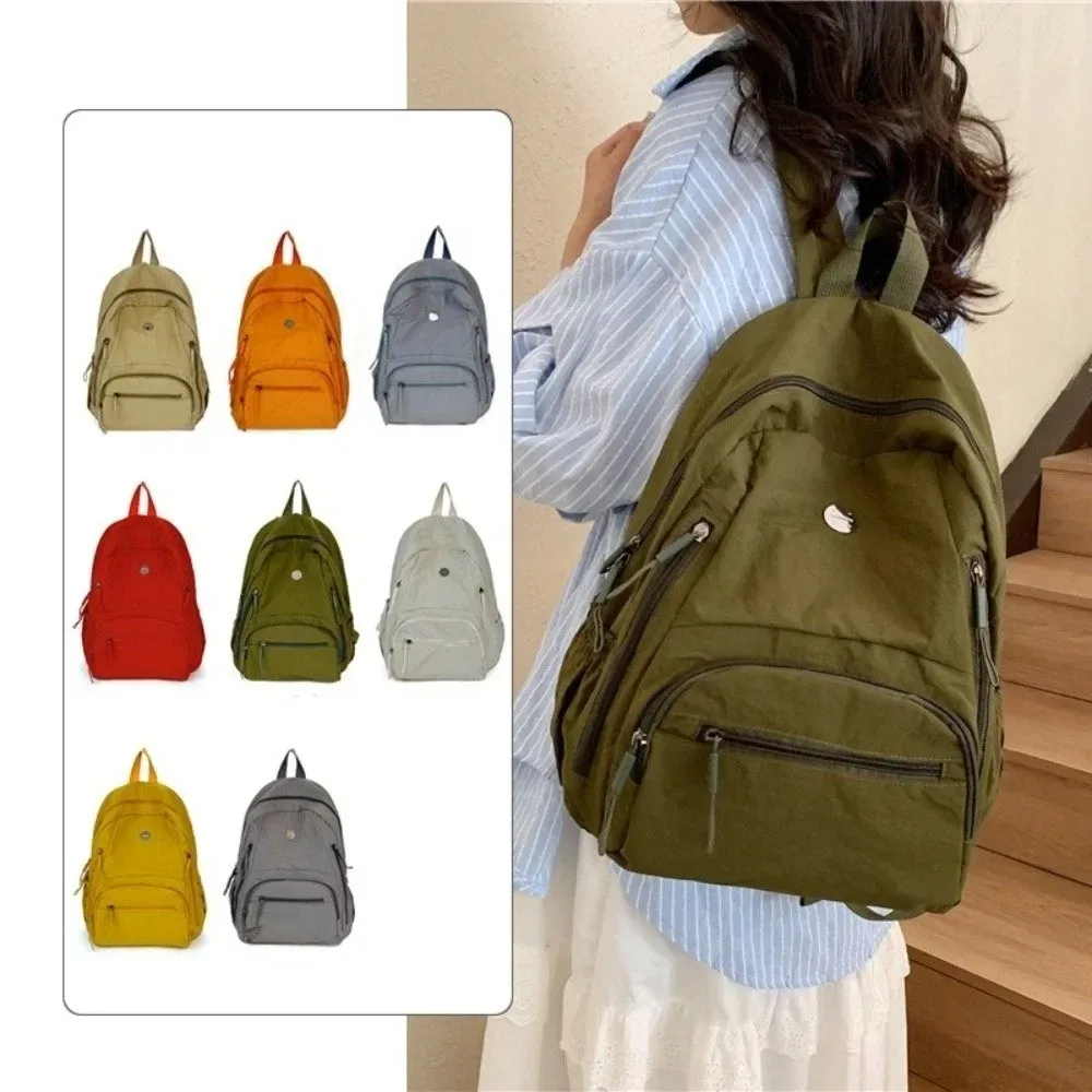 sac à dos scolaire tendance en nylon grande capacité, léger et durable, sac de voyage imperméable de couleur unie pour ordinateur portable, idéal pour le camping