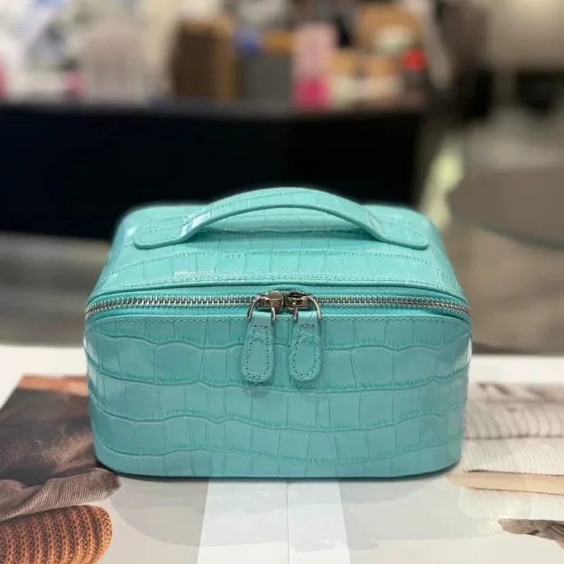 nouvelle trousse de maquillage en cuir véritable, motif crocodile, grande capacité, série de couleurs haut de gamme, sac de toilette portable de voyage