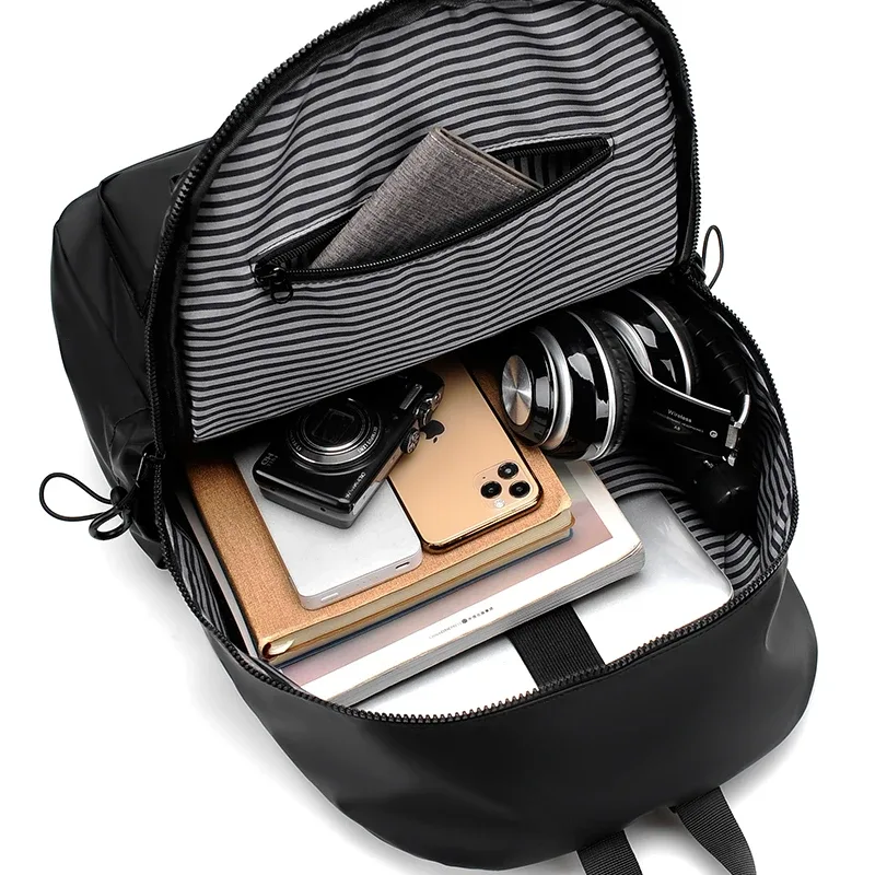 1 sac à dos décontracté à la mode de 14 pouces, compartiment spacieux pour ordinateur portable, tissu imperméable, idéal pour les hommes, les étudiants et les professionnels