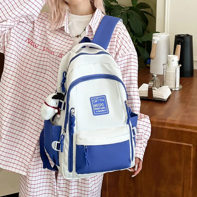 sac à dos simple et élégant à blocs de couleur, léger et de grande capacité pour étudiants, pour réduire la charge de travail et les trajets scolaires