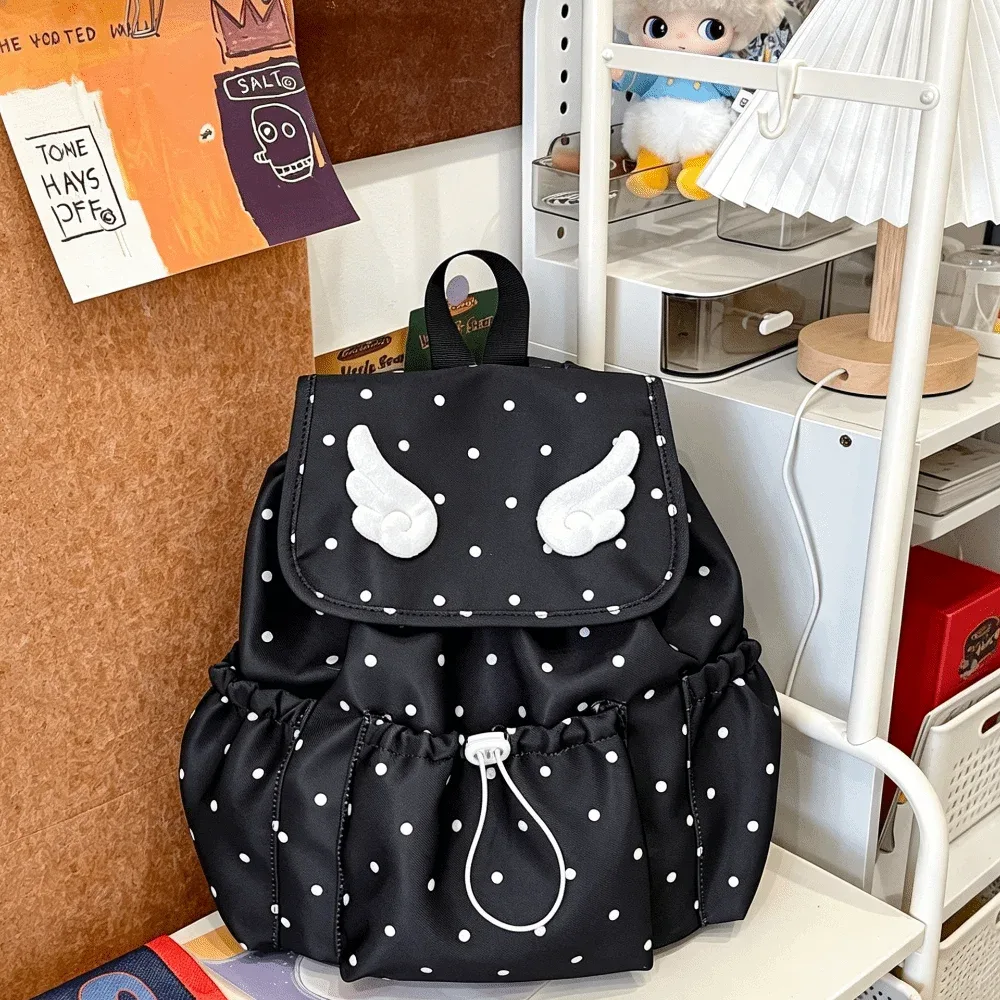 sac à dos à cordon de serrage imprimé à pois, fermeture à cordon, design à rabat, sac à dos pour livres, décor ailes d'ange, style décontracté