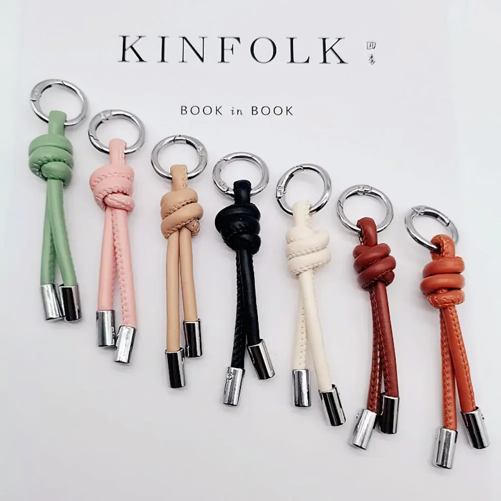 1 pièce de nouveau porte-clés pendentif, accessoires diy pour vêtements et bagages, accessoires de valise, cordon en cuir pour couple, simple et créatif.