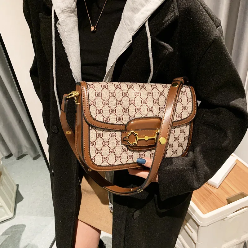 sac à bandoulière classique en cuir véritable pour femme, style selle, design parisien populaire, sac à main décontracté vintage et tendance