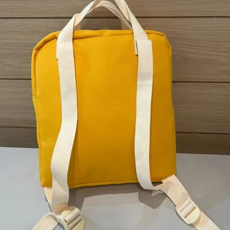 Nouveau sac à dos unisexe Snoopy jaune de dessin animé, grande capacité, pour la rentrée scolaire, sac d'école pour étudiants, sac de voyage en plein air