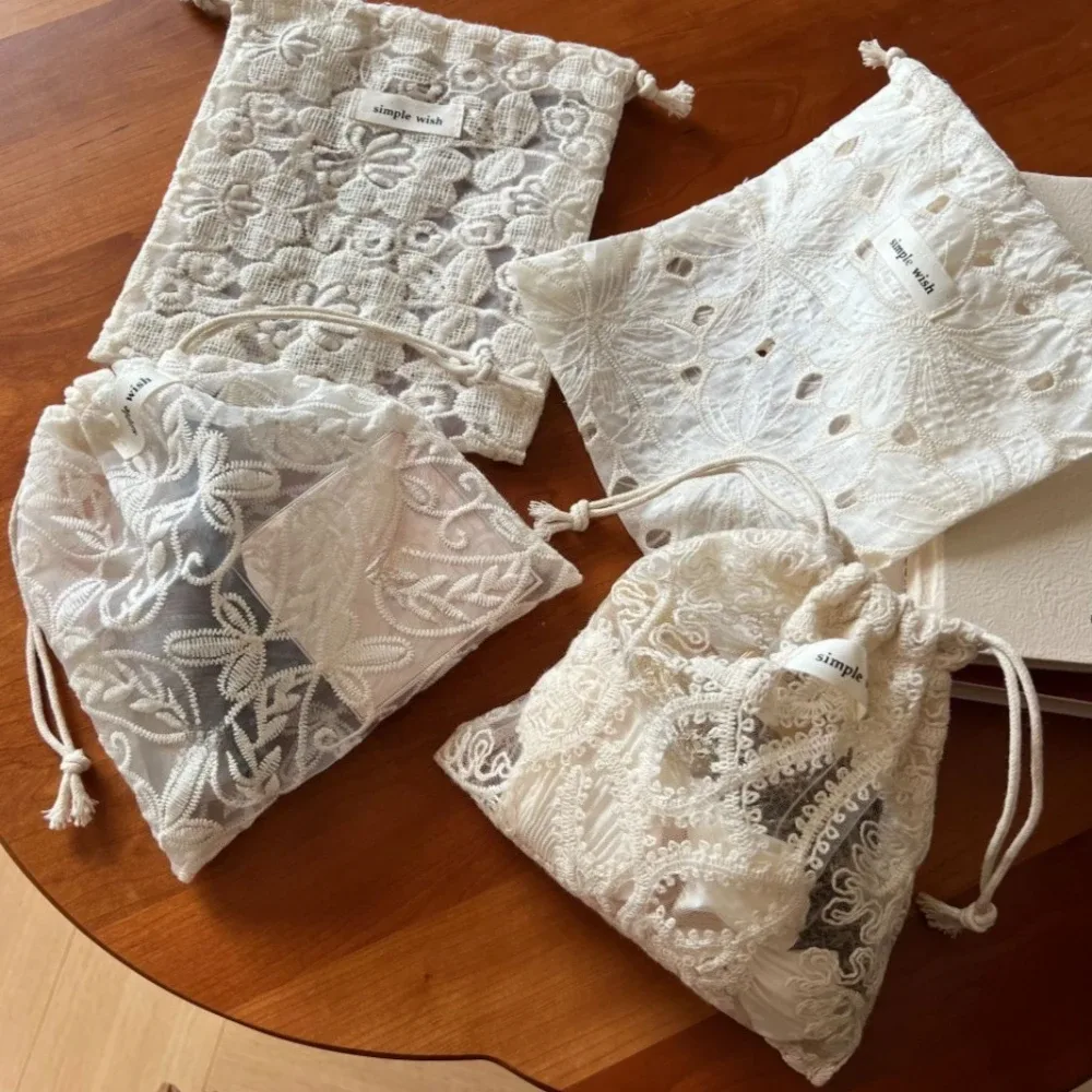 sacs de rangement cosmétiques vintage en dentelle blanche brodée, étuis en coton à motif floral ajouré avec cordon de serrage, pochette de rangement pour maquillage