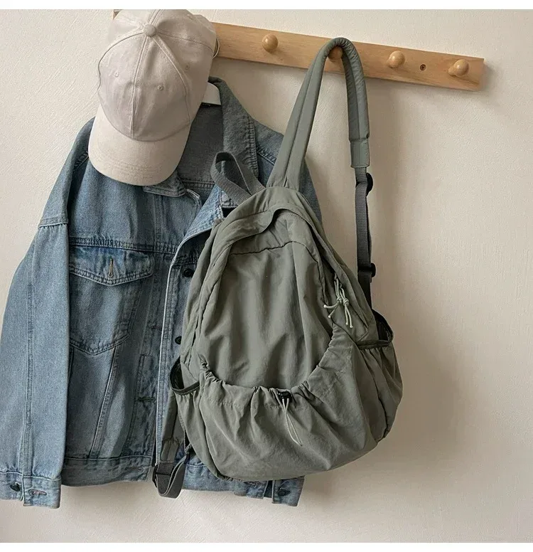 2025 sac à dos décontracté femmes grande capacité mode junior lycée étudiant pli cartable sac en tissu coréen voyage sac à dos