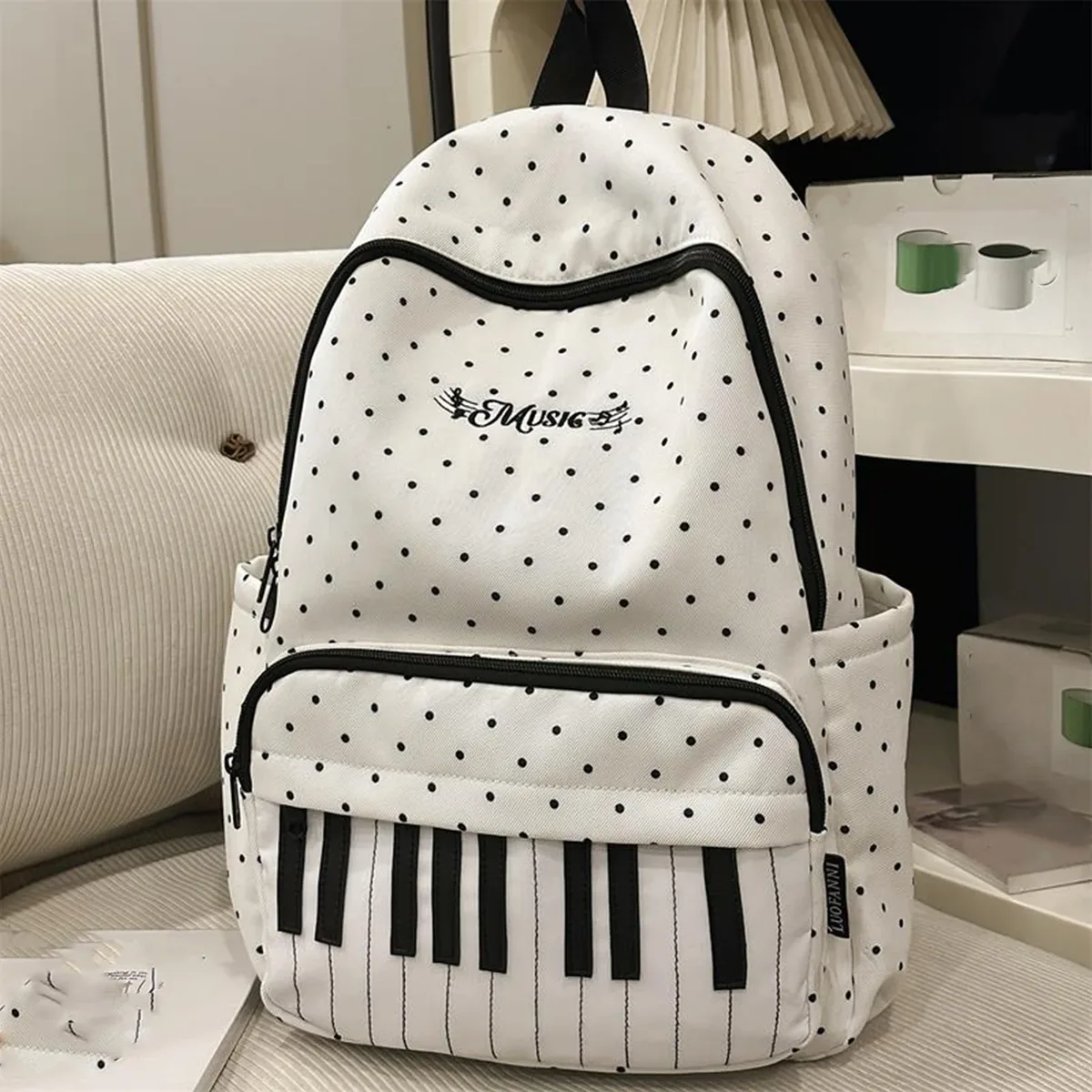 sac à dos décontracté en nylon 16,9 pouces à pois avec motif clavier de piano et pendentif pour adolescentes, idéal pour les voyages, le shopping et l'usage quotidien