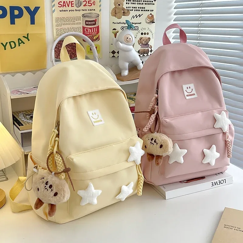 sac à dos rose mignon pour filles cartable à la mode décoré d'étoiles avec porte-clés en peluche parfait pour une utilisation quotidienne et l'école style adorable et tendance idéal pour adolescente