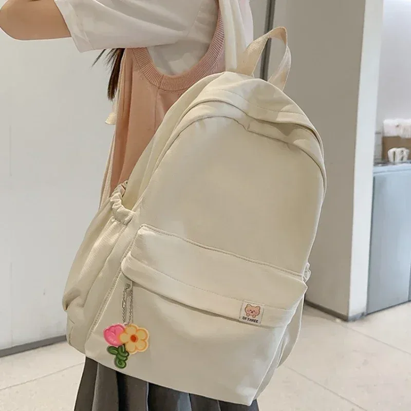 nouveau sac à dos imperméable en nylon pour femmes sac de voyage pour femmes sacs à dos cartable pour adolescentes couleur unie bookbag mochila bookbag